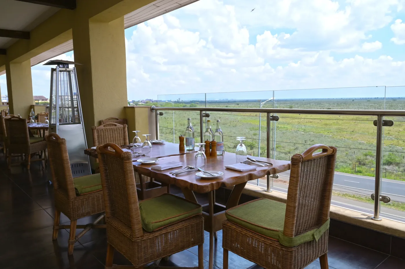 Ole Sereni's rooftop terrace, dining tables looking out over the plains